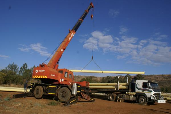 Crane Truck Loading HDPE Pipe